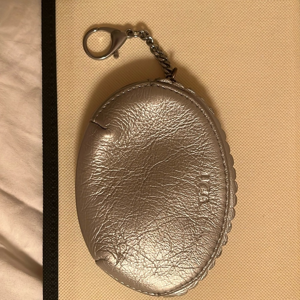UGG Used but in good condition pewter colored UGG coin purse